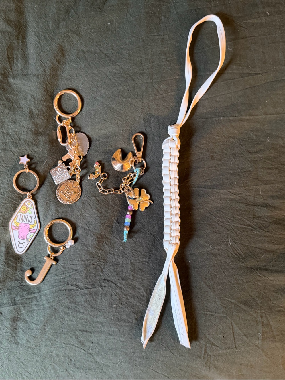 A New Day bag charms in GUC (the charms are almost brand new!)